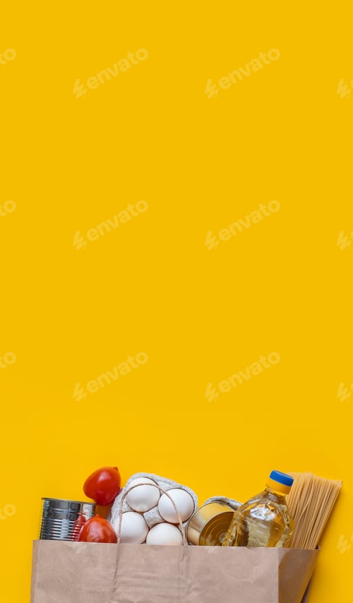 Grocery Food in a Brown Bag on Yellow
