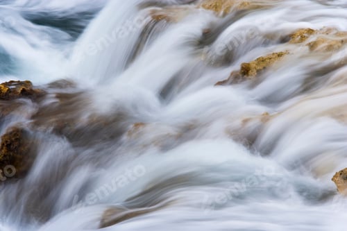 Preview: Sea water tides flowing over rocks, time lapse photography,