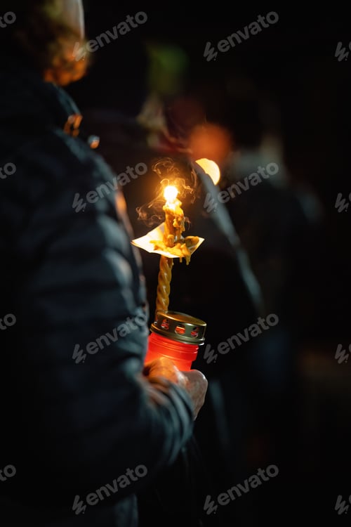 Preview: Person holding a candle with melted wax, Feast of the Resurrection of Jesus Christ, Northern Romania