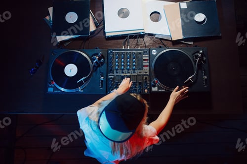 Preview: Cute dj woman having fun playing music at club party