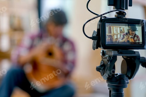 Preview: The monitor of camera show Asian senior craftsman present his wood product