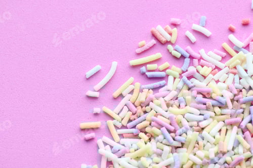 Preview: Colorful Sprinkles on Bright Pink Surface, Sweet Treat