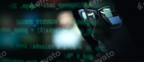 Preview: Hacker with sunglasses and code on the screen