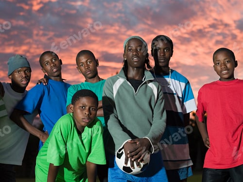 Preview: Group of teenage boys with football