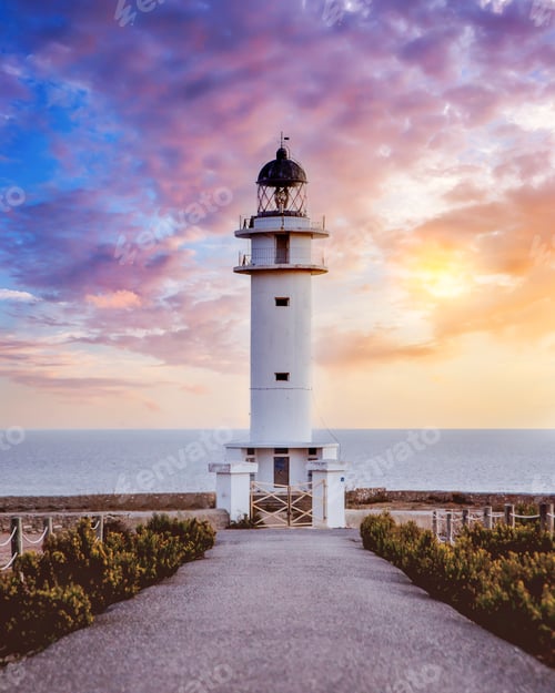 Preview: Road leading to a lighthouse at sunset