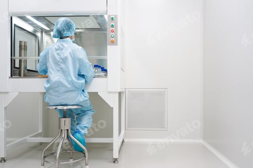Preview: Scientist Working in Clean Lab Conditions