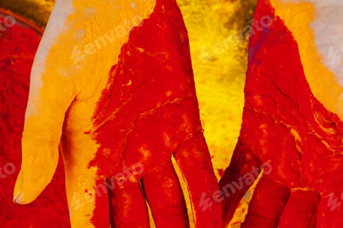 Preview: Hands holding Holi powder paint, view from above