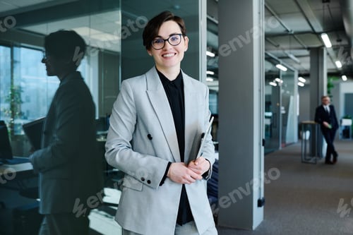 Preview: Successful female leader working at office