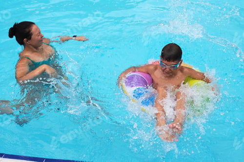 Preview: Cheerful pool time; a mother and son's leisure. Highlights the trend of wellness and happiness in
