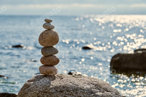 Preview: Balanced Stones by Seaside Creating Serene Scene