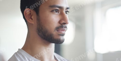 Preview: Cropped shot of a young male athlete standing in the gym