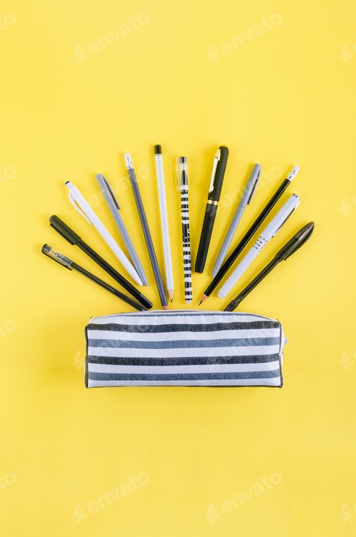 Preview: School supplies on yellow background. Back to school.