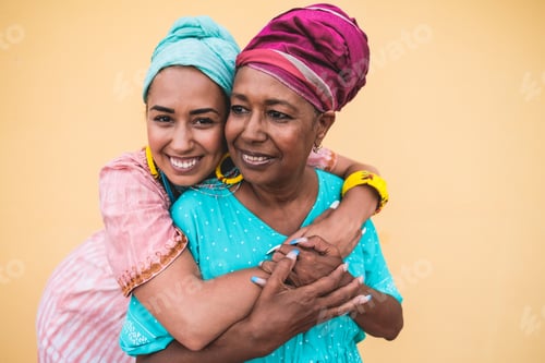 Preview: Happy african girl hugging her mother - Family, mother and adult child love