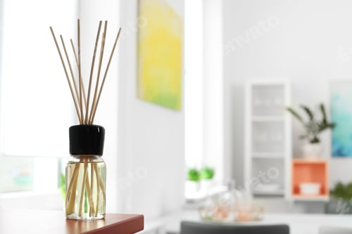 Preview: Aromatic reed air freshener on table in room