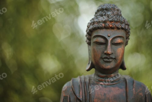 Preview: Buddha Statue in Outdoor Garden With Blurred Background