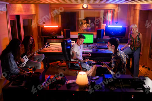 Preview: Pep talk with a band during vocal recording session.