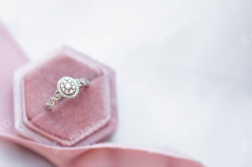 Preview: Diamond wedding ring on pink ring box