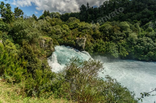 Preview: scenic shot of beautiful waterfall in forest, Huka Falls, New Zealand
