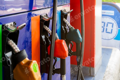 Preview: Petrol pump filling fuel nozzle in gas station. Fuel dispenser. Refuel fill up with petrol gasoline.