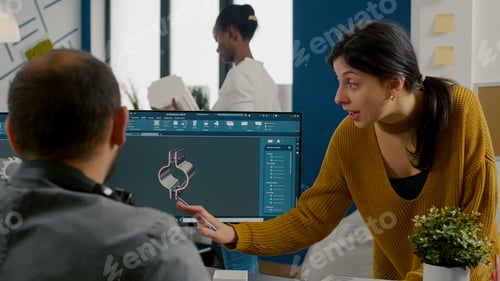 Preview: Industrial woman designer discussing with technician engineer