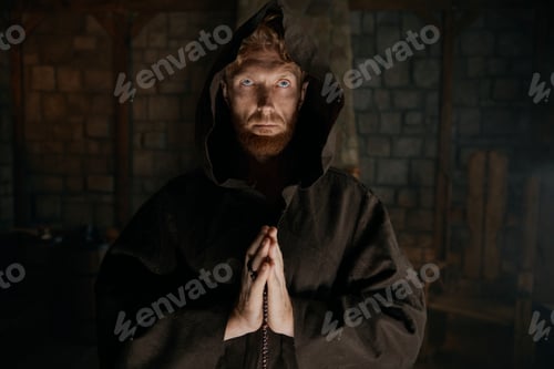 Preview: Portrait of blessed priest praying having faith believe in God