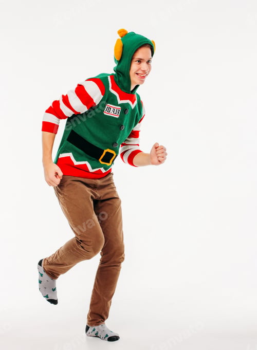 Preview: Attractive young men teenager in elf costume on white background
