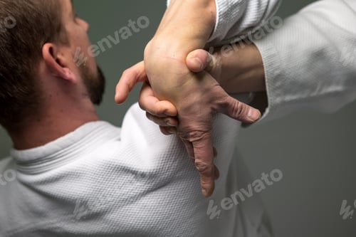 Preview: Two Caucasian Men Are Practicing Aikido On The Tatami