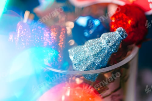 Preview: Christmas holiday background with festive decor bokeh shot