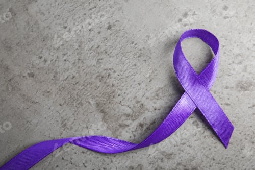 Preview: Purple ribbon on grey stone background, top view. Domestic violence awareness