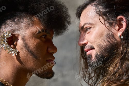 Preview: Two androgynous men looking at each other