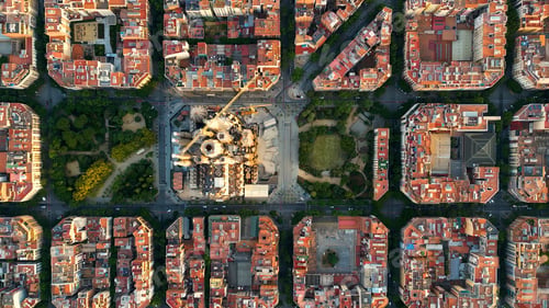Preview: Aerial view of Barcelona city skyline and Sagrada Familia Cathedral. Eixample residential grid
