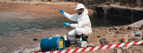 Preview: Scientist wear protection suit checking chemical and water analysis and water quality from factory.