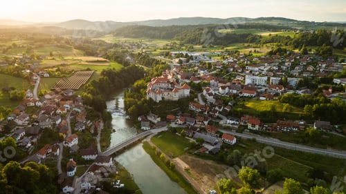 Preview: Zuzemberk Castle and medieval village on the river Krka in Slovenia. Aerial drone view