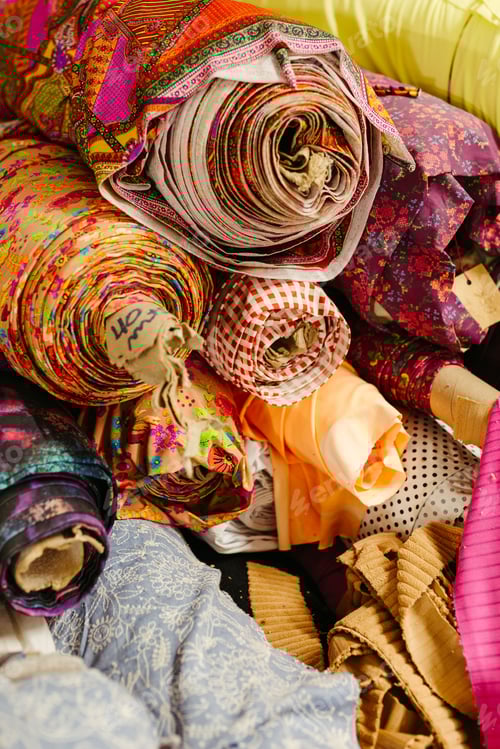 Preview: Colorful Rolls of Fabric in a Variety of Patterns