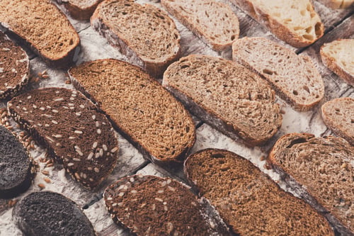Preview: Bakery concept. Plenty of sliced bread background