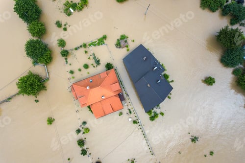 Preview: Aerial view of flooded houses with dirty water of Dnister river in Halych town, western Ukraine