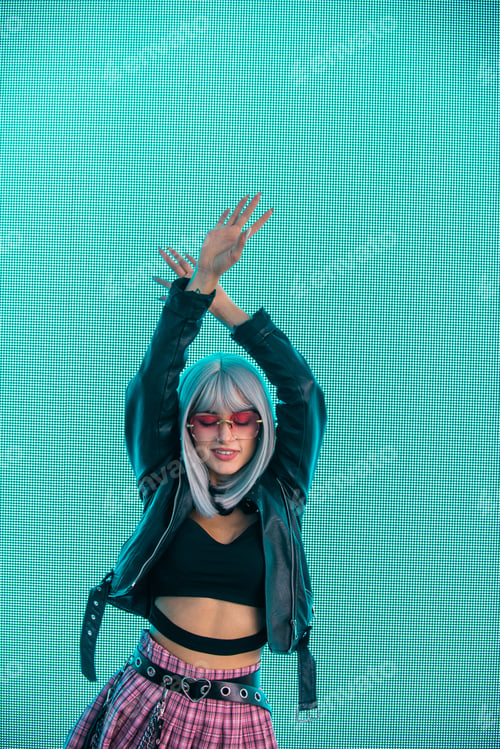 Preview: Beautiful woman illuminated by led lights