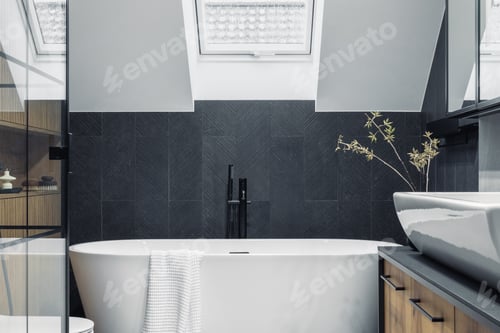 Preview: Stylish interior of bathroom with bathtub, shower, towels and other personal bathroom accessories.