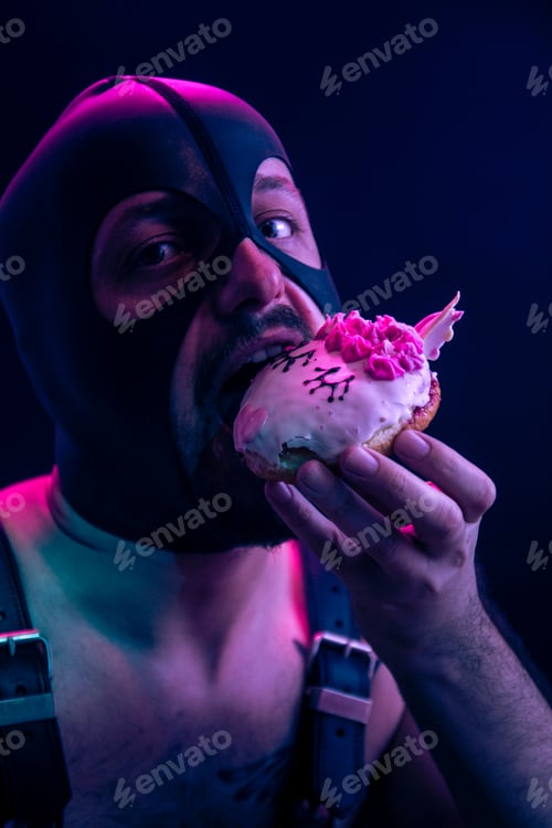 Preview: One Kinky Man, Eating A Cookie, As A Sexy And Kinky Concept. Wearing A Hood.