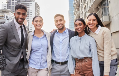 Preview: Cropped portrait of a group of young businesspeople standing on an office balcony