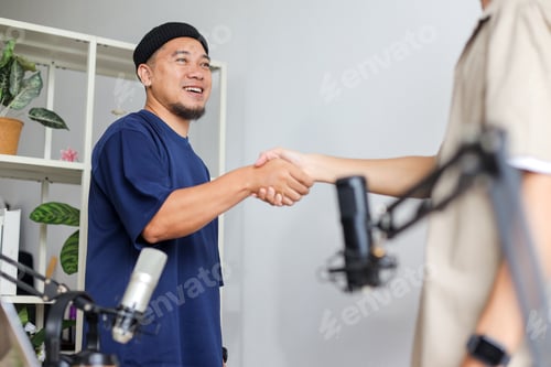 Preview: Podcast Artist Making a Handshake with His Interviewer