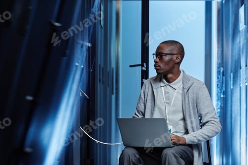 Preview: Man Setting Up Server