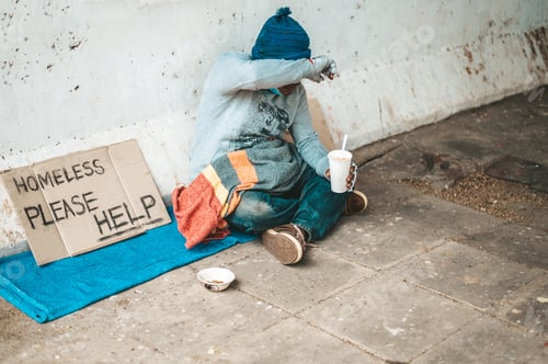 Preview: The beggars sat wrapped in cloths and eating noodles.