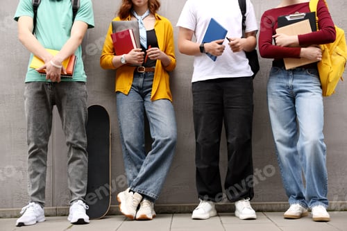 Preview: Group of teenagers posing near building outdoors, closeup