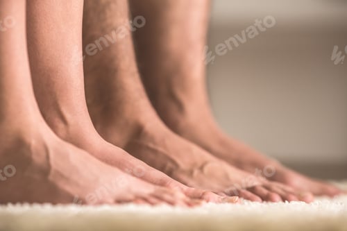 Preview: The couple of legs on the carpet