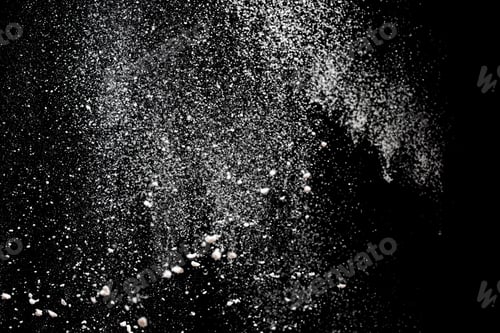 Preview: White powder explosion. White powder splash isolated on black background. Flour sifting on a dark