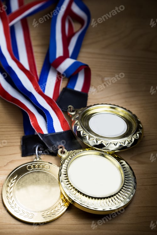 Preview: Three sporting event gold medal with red and blue ribbon