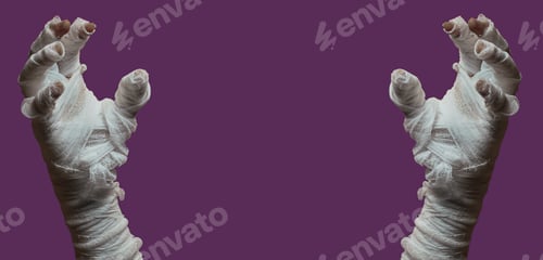 Preview: Halloween background. Bandaged hands of a zombie on a purple background. Halloween design.