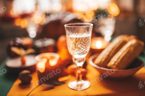 Preview: Thanksgiving holiday dinner table setting with fall decoration and pumpkins