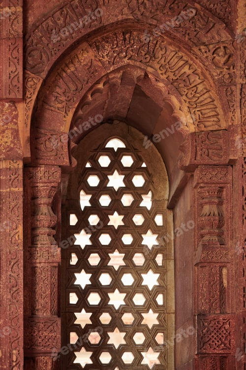 Preview: Decorative window shutters of Alai Darwaza landmark part of Qutb complex in South Delhi, India,